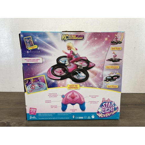 456 - A boxed Barbie RC Flying Hoverboard