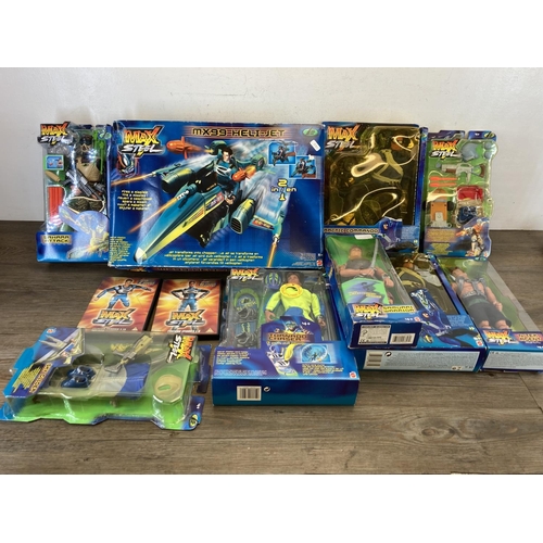 458 - A collection of boxed Max Steele collectables to include boxed Sahara Attack figurine, boxed Tornado... 