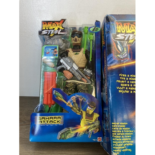 458 - A collection of boxed Max Steele collectables to include boxed Sahara Attack figurine, boxed Tornado... 