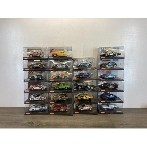 462 - Twenty three boxed Carrera Evolution & ExclusiV slot cars to include Aston Martin V12 Vantage GT3, M...