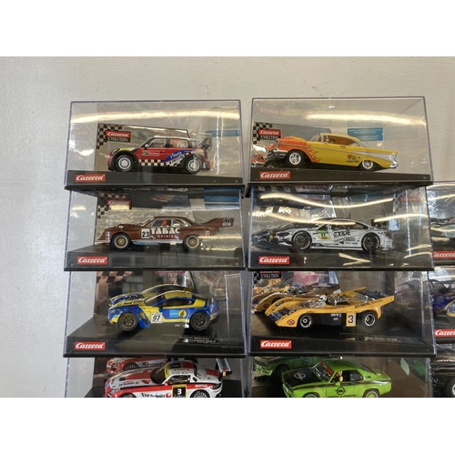 462 - Twenty three boxed Carrera Evolution & ExclusiV slot cars to include Aston Martin V12 Vantage GT3, M... 