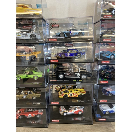 462 - Twenty three boxed Carrera Evolution & ExclusiV slot cars to include Aston Martin V12 Vantage GT3, M... 