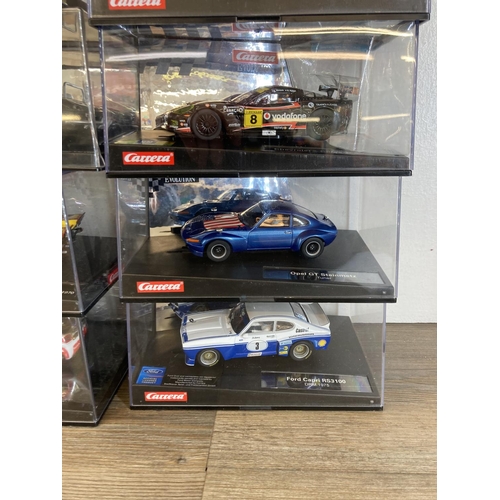 462 - Twenty three boxed Carrera Evolution & ExclusiV slot cars to include Aston Martin V12 Vantage GT3, M... 