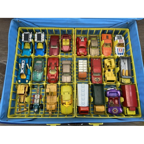 464 - Four Matchbox carry cases containing a collection of diecast model vehicles to include Matchbox Pors... 