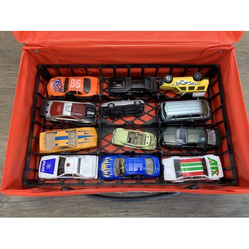 464 - Four Matchbox carry cases containing a collection of diecast model vehicles to include Matchbox Pors... 