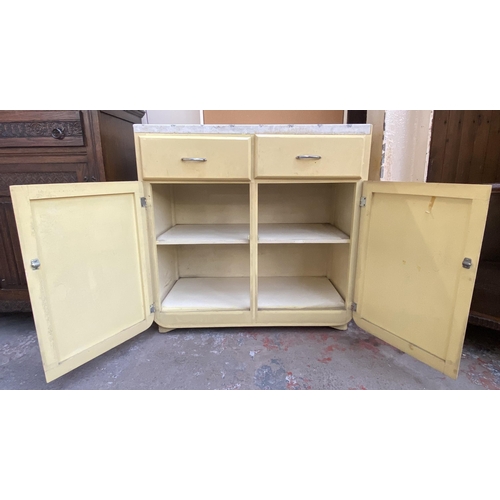 84 - A 1950s yellow painted kitchen cabinet with contents - approx. 90cm high x 91cm wide x 45cm deep