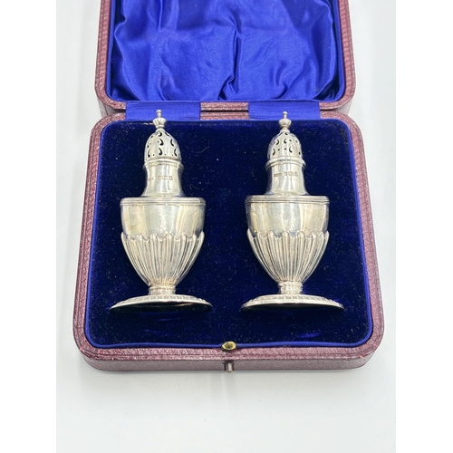 2335 - A pair of cased Edwardian James Dixon & Sons Ltd hallmarked Sheffield pepper pots, dated 1909 - appr... 