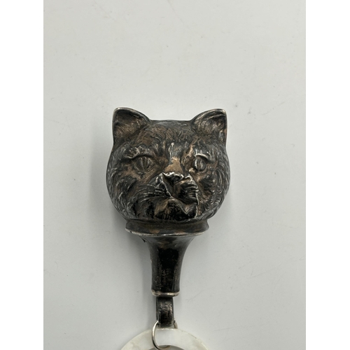 2340 - An antique hallmarked silver novelty cat shaped baby rattle with mother of pearl teething ring - app... 