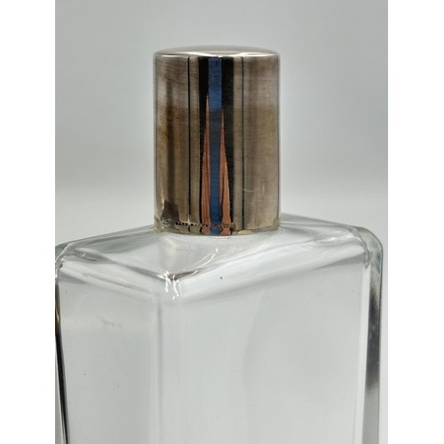 2352 - A boxed Penhaligon's perfume bottle with stamped .925 sterling silver top - approx. 11.5cm high