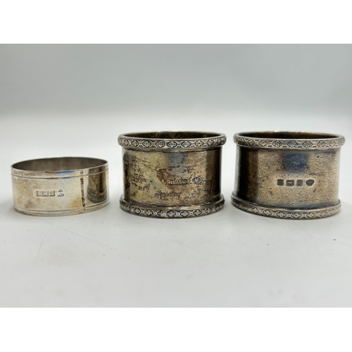 2353 - Three hallmarked silver napkin rings, two Birmingham and one Chester - approx. gross weight 138.5g