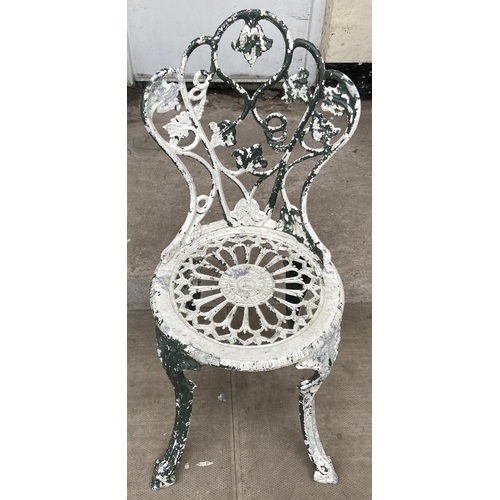 100 - A Victorian style cast metal five piece patio set comprising circular table and four chairs - table ... 