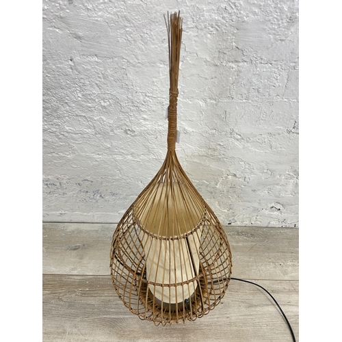 12 - A Boho style wicker and fabric table lamp - approx. 72cm high