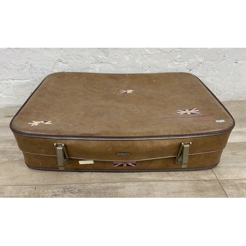 15 - Five early/mid 20th century travel trunks and suitcases to include brown metal, Superslat etc.