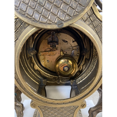 2 - A 20th century Italian Brevettato brass and white marble mantel clock and garniture set with cherub ... 