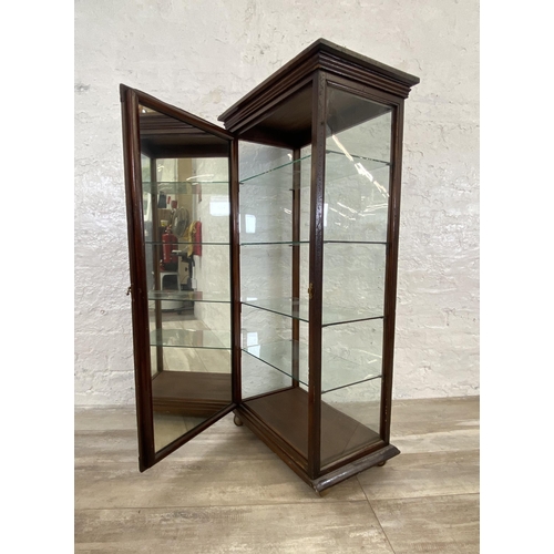 24 - A late 19th/early 20th century mahogany shop display cabinet with four glass shelves - approx. 114cm... 