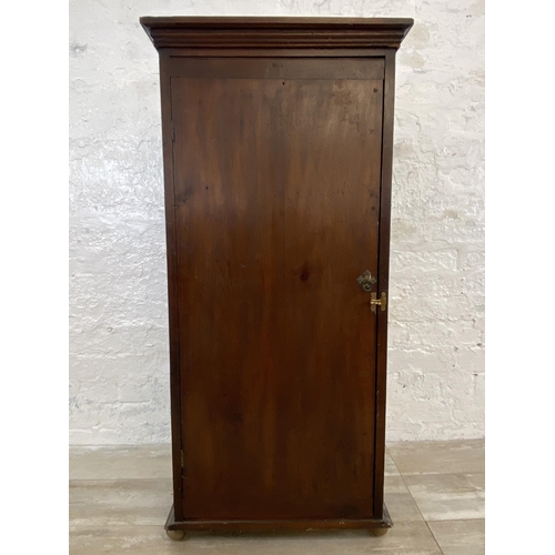 24 - A late 19th/early 20th century mahogany shop display cabinet with four glass shelves - approx. 114cm... 