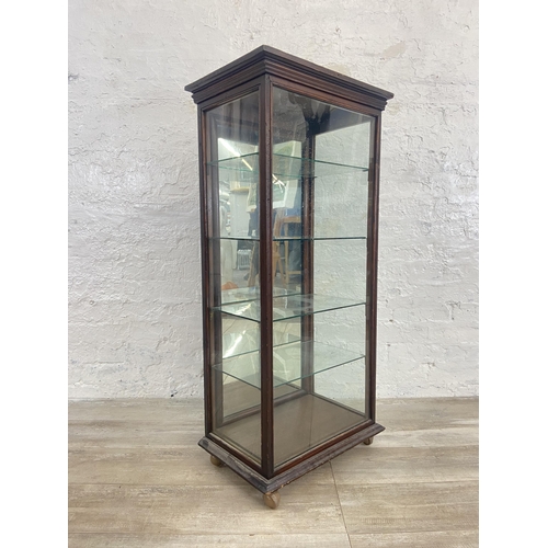 24 - A late 19th/early 20th century mahogany shop display cabinet with four glass shelves - approx. 114cm... 