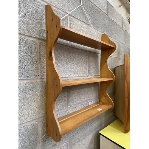 28 - Two pieces of pine wall hanging furniture, one three tier shelving unit and one corner two tier shel... 