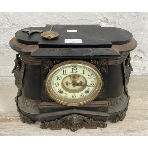 3 - A late 19th/early 20th century The Ansonia Clock Co. of New York USA black painted cast metal chimin... 