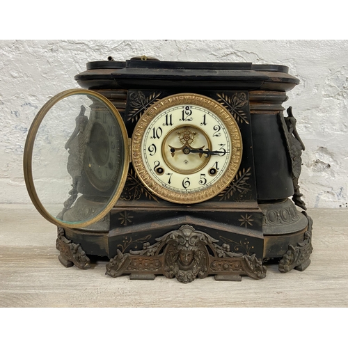 3 - A late 19th/early 20th century The Ansonia Clock Co. of New York USA black painted cast metal chimin... 