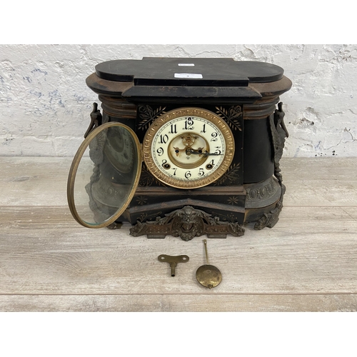 3 - A late 19th/early 20th century The Ansonia Clock Co. of New York USA black painted cast metal chimin... 