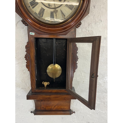 30 - A 19th century mahogany cased chiming wall clock with pendulum and key - approx. 100cm high x 41cm w... 