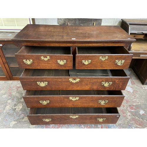 37 - A George III oak chest of drawers on bracket supports - approx. 117cm high x 130cm wide x 56cm deep