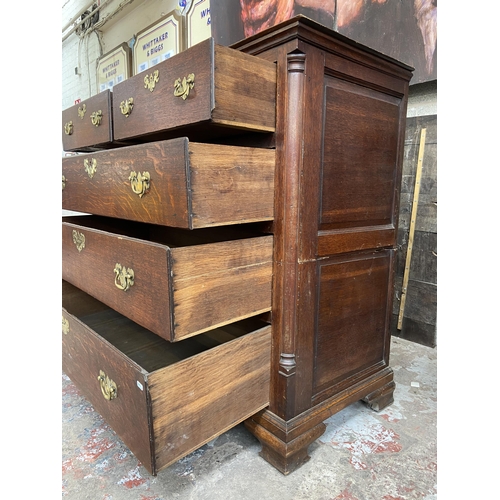 37 - A George III oak chest of drawers on bracket supports - approx. 117cm high x 130cm wide x 56cm deep