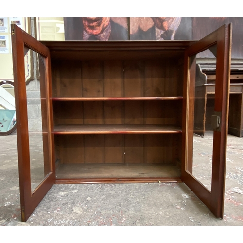 38 - A Victorian mahogany two door glazed bookcase top - approx. 90cm high x 108cm wide x 42cm deep