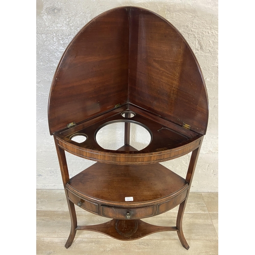 39D - A Georgian mahogany corner wash stand - approx. 131cm high when extended x 86cm high unextended x 70... 