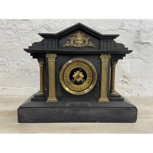 3A - A Victorian black slate chiming mantel clock with brass decoration, Corinthian columns and key - app... 