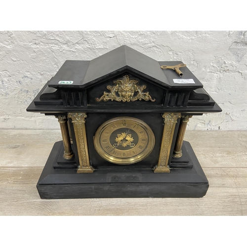 3A - A Victorian black slate chiming mantel clock with brass decoration, Corinthian columns and key - app... 