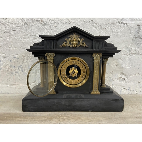 3A - A Victorian black slate chiming mantel clock with brass decoration, Corinthian columns and key - app... 