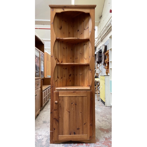 45 - A pine free standing corner cabinet - approx. 183cm high