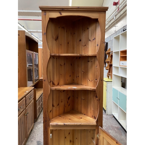 45 - A pine free standing corner cabinet - approx. 183cm high