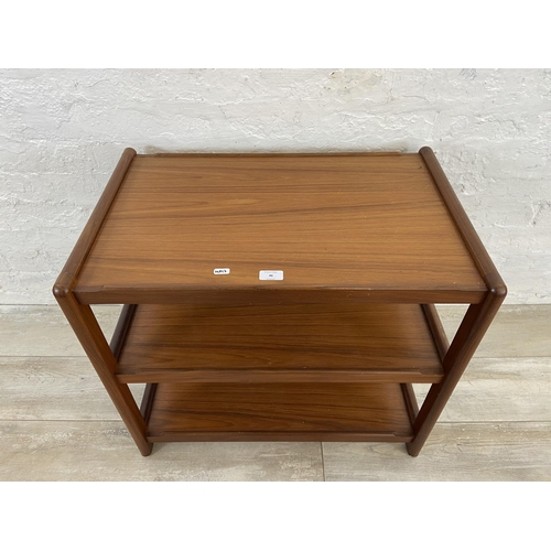 46 - A mid 20th century teak three tier serving trolley/side table - approx. 61cm high x 68cm wide x 44cm... 