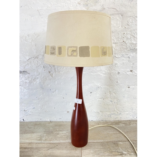 49 - A mid 20th century teak table lamp with shade - approx. 57cm high