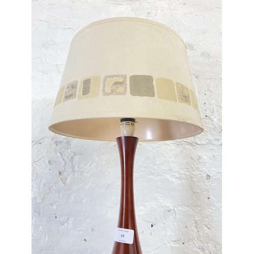 49 - A mid 20th century teak table lamp with shade - approx. 57cm high