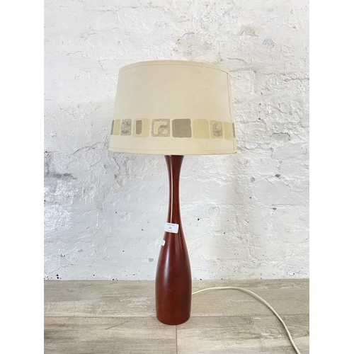 49 - A mid 20th century teak table lamp with shade - approx. 57cm high