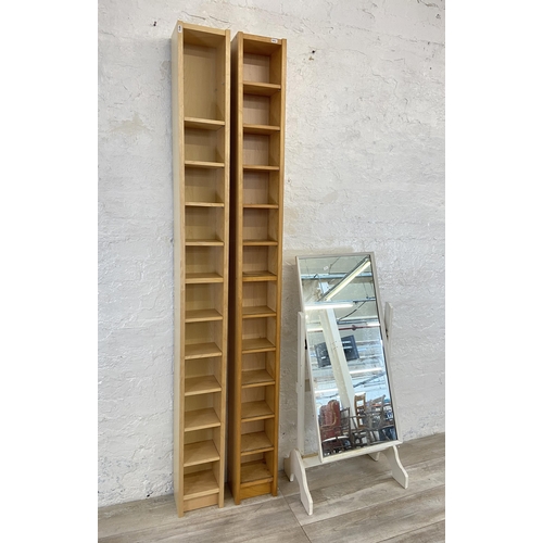 51 - Three pieces of furniture, two modern beech CD shelving units - approx. 202cm high and one mid 20th ... 