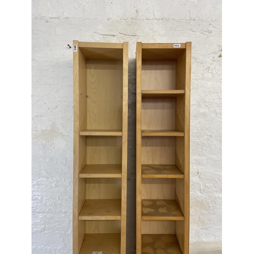 51 - Three pieces of furniture, two modern beech CD shelving units - approx. 202cm high and one mid 20th ... 