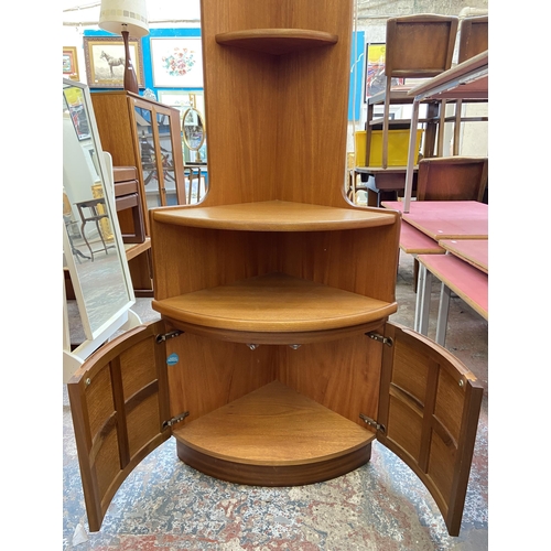 53 - A Nathan Squares teak free standing corner cabinet - approx. 194cm high