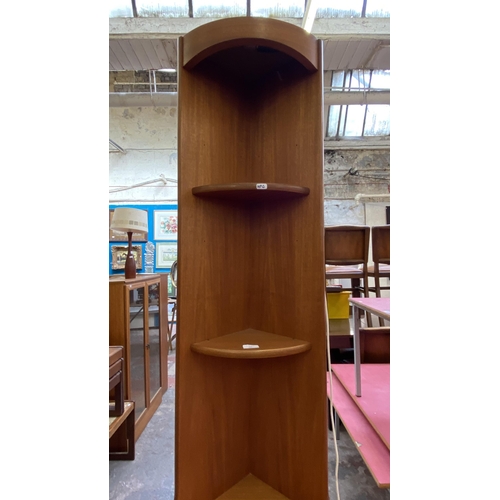 53 - A Nathan Squares teak free standing corner cabinet - approx. 194cm high