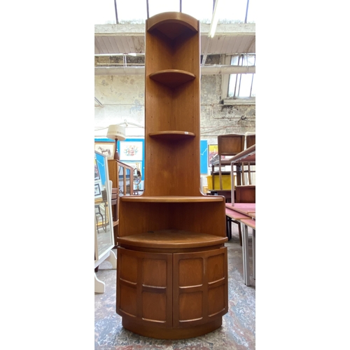 54 - A Nathan Squares teak free standing corner cabinet - approx. 194cm high