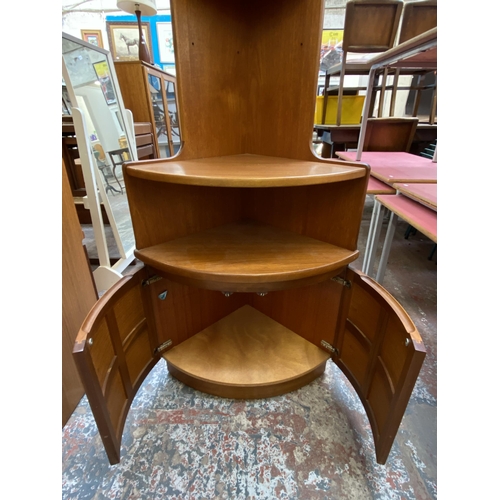 54 - A Nathan Squares teak free standing corner cabinet - approx. 194cm high