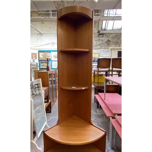 54 - A Nathan Squares teak free standing corner cabinet - approx. 194cm high