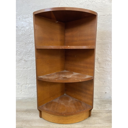 55 - Three mid 20th century teak corner shelving units