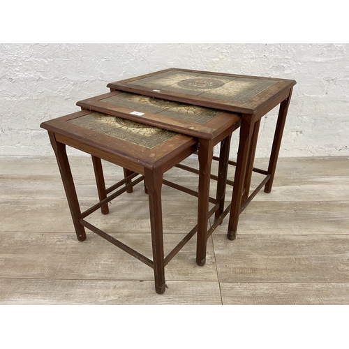 56 - A mid 20th century Danish Mobelfabrikken Toften teak and ceramic tiled top nest of tables - approx. ... 