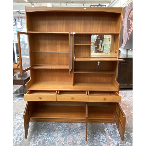 57 - A Nathan Squares teak wall unit - approx. 194cm high x 152cm wide x 45cm deep