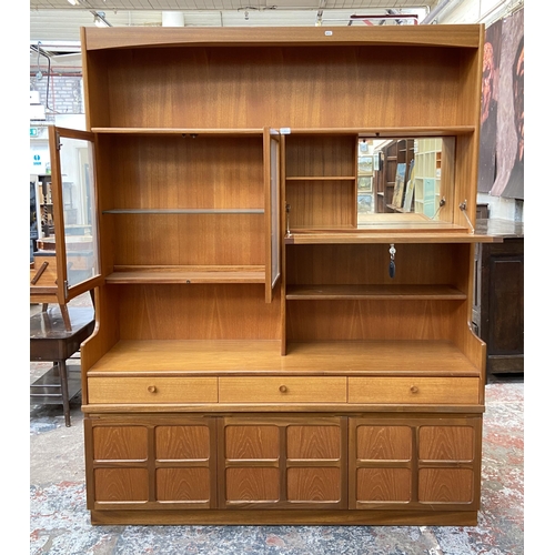 57 - A Nathan Squares teak wall unit - approx. 194cm high x 152cm wide x 45cm deep